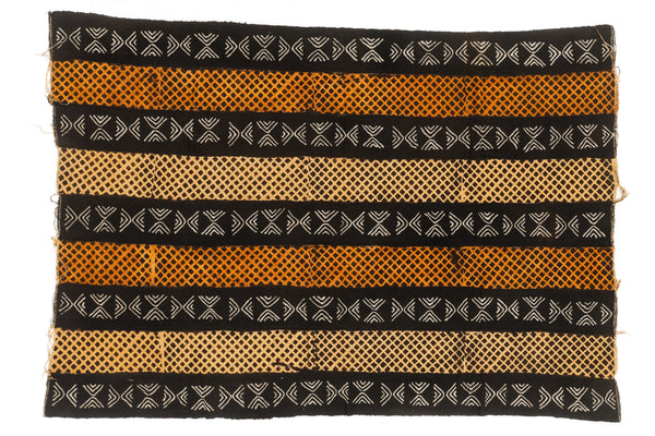 Woven textile with black, orange, and beige stripes on a white background
