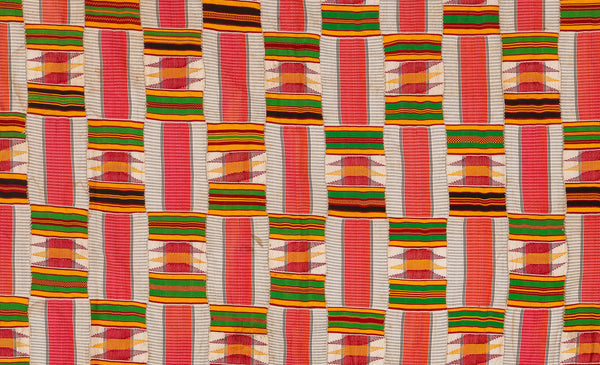 Patterned fabric with red, green, and orange colors